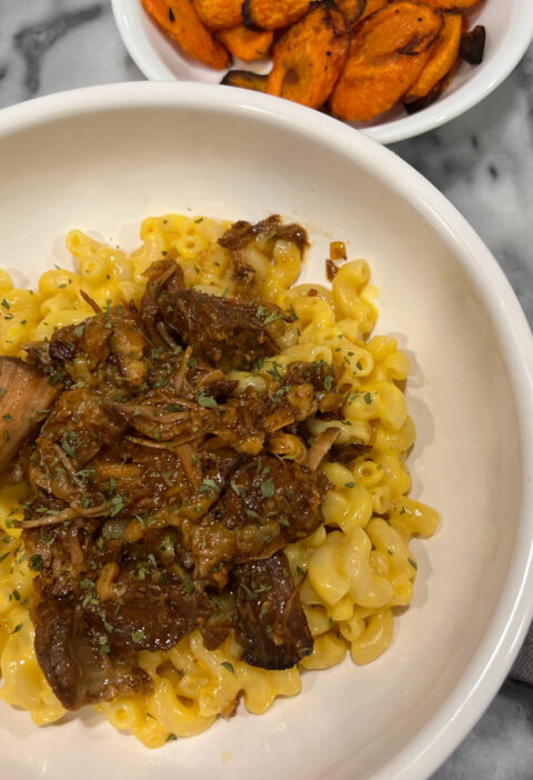 bowl of pulled pork mac and cheese