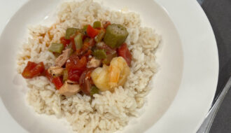 instant pot gumbo served over rice in a large bowl