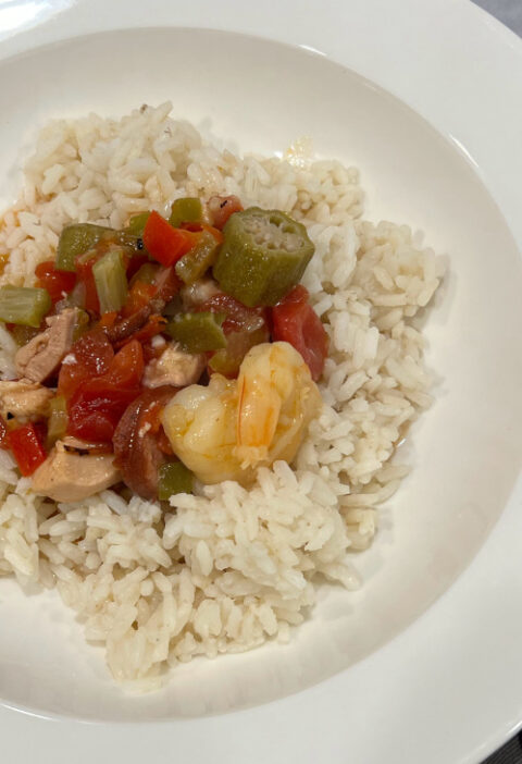 instant pot gumbo served over rice in a large bowl