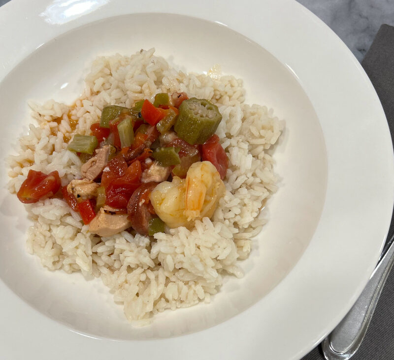 instant pot gumbo served over rice in a large bowl